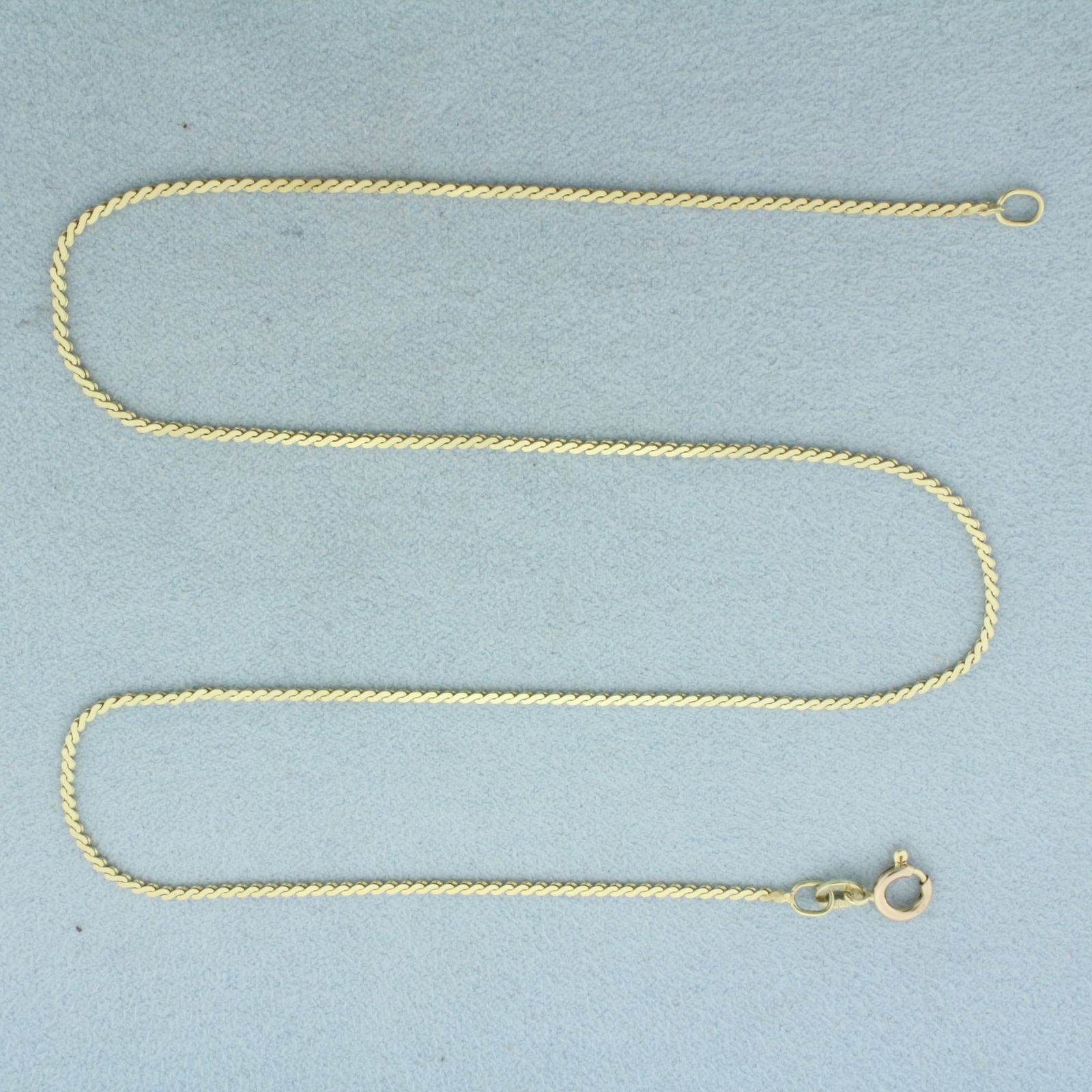 Italian 15 Inch S-Link Chain Necklace in 14k Yellow Gold: In 14k Yellow Gold. 15 inches long. 1.2mm wide. Spring clasp. 2.8g.
