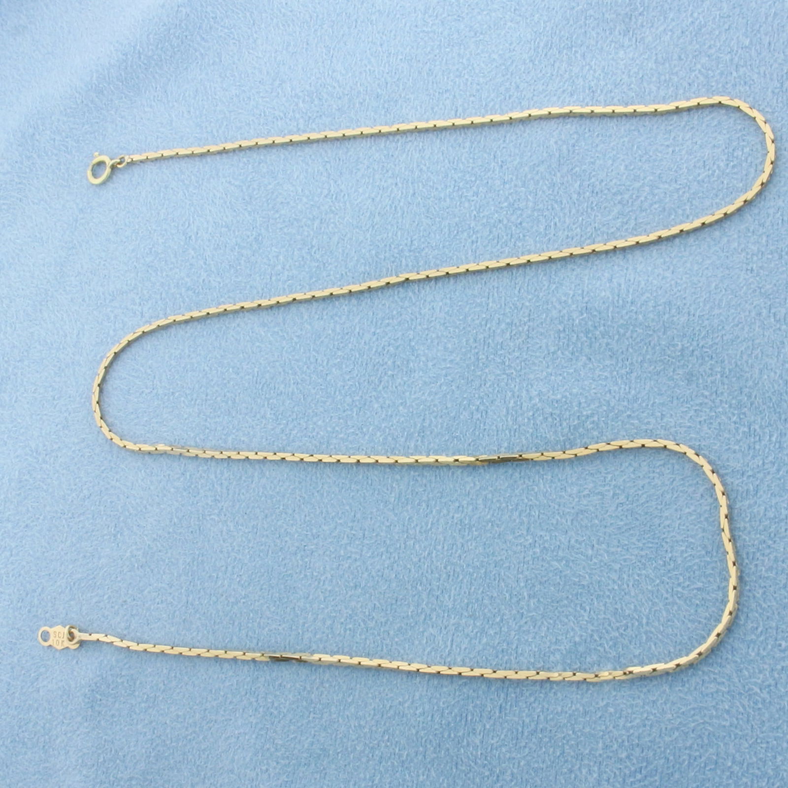 18 Inch Boston Link Chain Necklace in 10k Yellow Gold: In 10k Yellow Gold. 18 inches long. 1mm wide. Spring clasp. 3.9g.