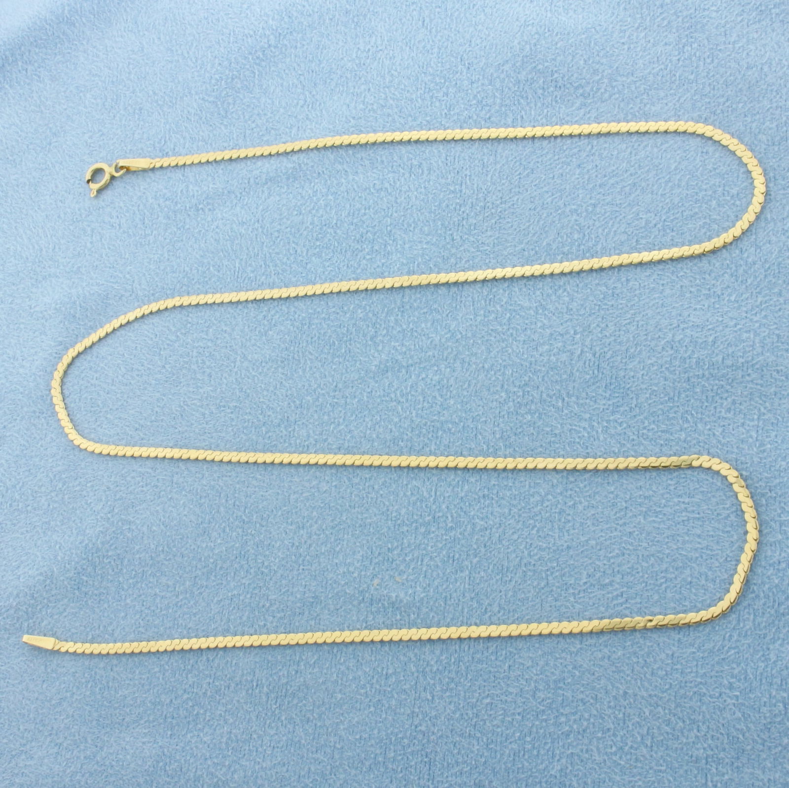 Italian 18 Inch S-Link Chain Necklace in 14k Yellow Gold: In 14k Yellow Gold. 18 inches long. 1.6mm wide. Made in Italy. Spring clasp. 3.4g.