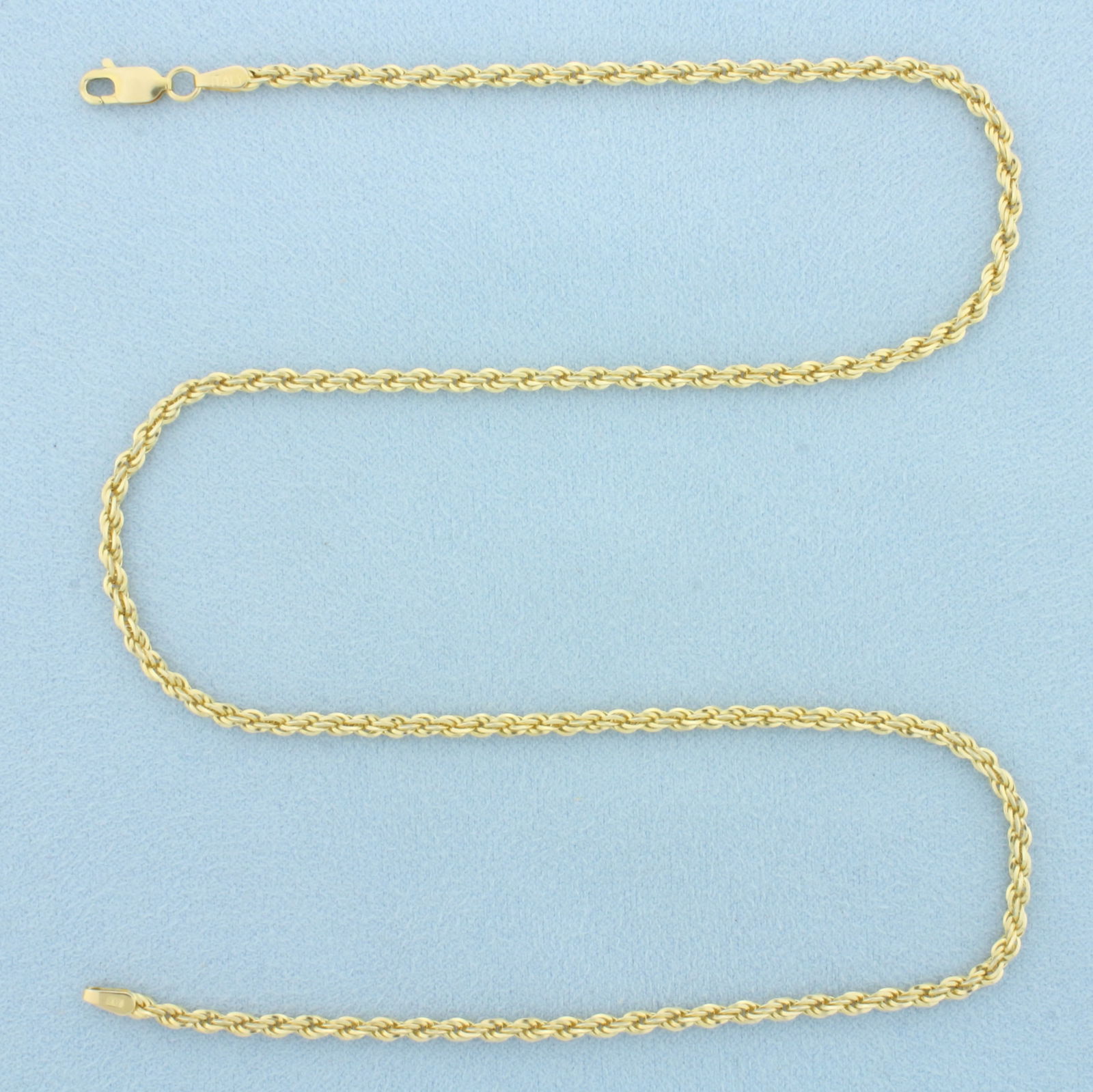 Italian 18 Inch Rope Link Diamond Cut Chain Necklace in 14k Yellow Gold: In 14k Yellow Gold. 18 inches long. 2.6mm wide. Made in Italy. Lobster clasp. Diamond cut for added brilliance. 9.5g.