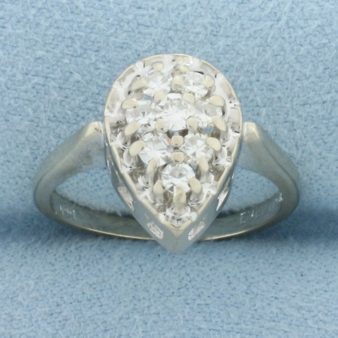 Diamond Pear Shaped Ring in 14k White Gold: In 14k White Gold. Contains eight high quality diamonds, 3/4ct TW, VS clarity/G color. 14mm wide at top of ring. Size 5.5. 4.3g.