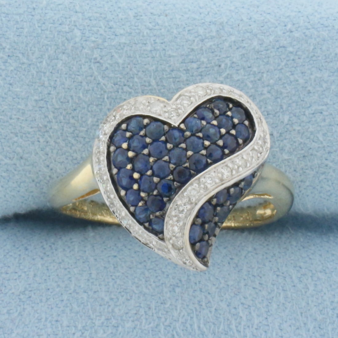 Sapphire and Diamond Pave Heart Ring in 10k Yellow Gold: In 10k yellow gold. 16mm wide at top. Contains twenty-nine high quality diamonds and thirty-seven high quality sapphires, 1/2ct TW, pave set. Size 9.25. 3.2g.