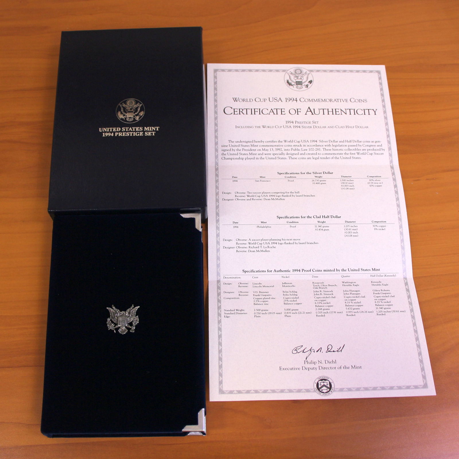 US Mint World Cup USA Prestige Coin Set OGP`: 1994 United States Mint World Cup USA Prestige Set including 1994 90% Silver Commemorative Silver Dollar. Set in original packaging and contains certificate of authenticity.