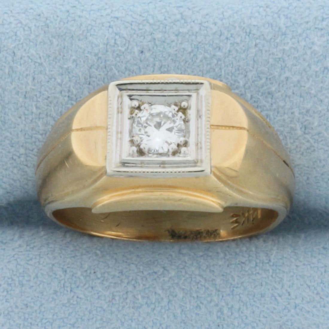 Vintage Solitaire Diamond Ring in 14K Yellow and White Gold: In 14K Yellow and White Gold. Contains one high quality 1/3ct round brilliant Diamond, VS clarity/F color. Size 8 3/4. 7.2g