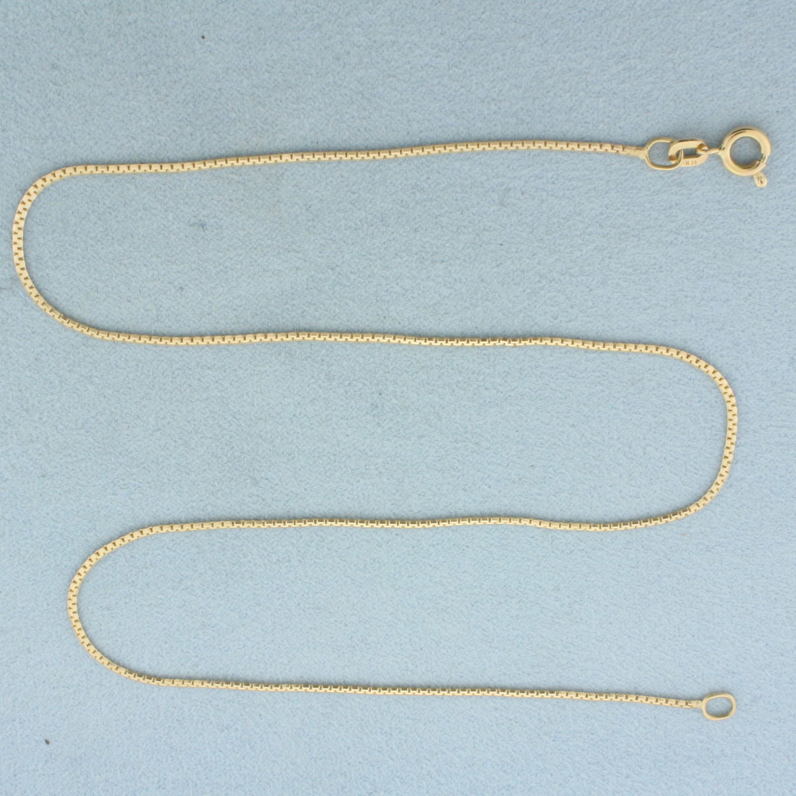 15 Inch Boston Link Chain Necklace in 14k Yellow Gold: In 14k Yellow Gold. 15 inches long. 1.2mm wide. Spring clasp. 2.2g.