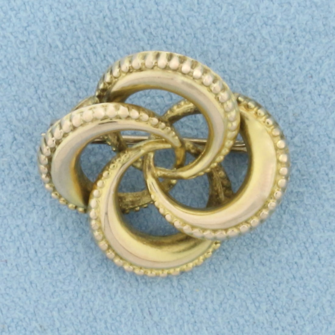 Vintage Interlocking Circles Pin Brooch in 14k Yellow Gold: In 14k Yellow Gold. 2/3 inch long. 2/3 inch wide. 1.6g.