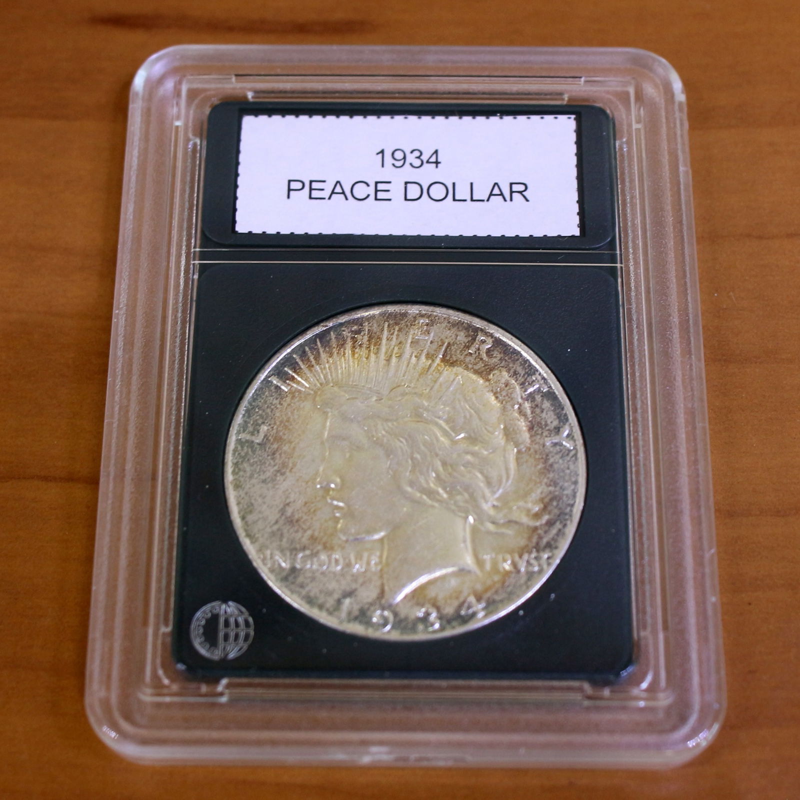 1934 Peace Silver Dollar Coin Key Date in Slab: Condition Shown in picture. From CoinWorld. Key Date.