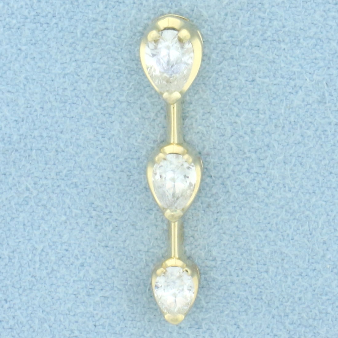 Three Stone Pear Diamond Pendant in 14k Yellow Gold: In 14k yellow gold. Past, present, and future design. Contains three high quality pear shaped diamonds, one 1/4ct, one 1/3ct, one .42ct, H color/I clarity. 1ct TW. 1 inch long. 1.7g.