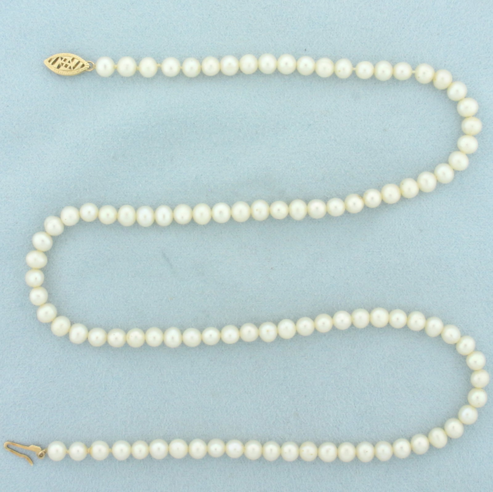 Cultured Pearl Strand Necklace with 14k Gold Clasp: 14k yellow gold clasp. Contains One hundred 5mm cultured pearls with high luster. 18 inches long. Fish Hook Clasp. 14.1g