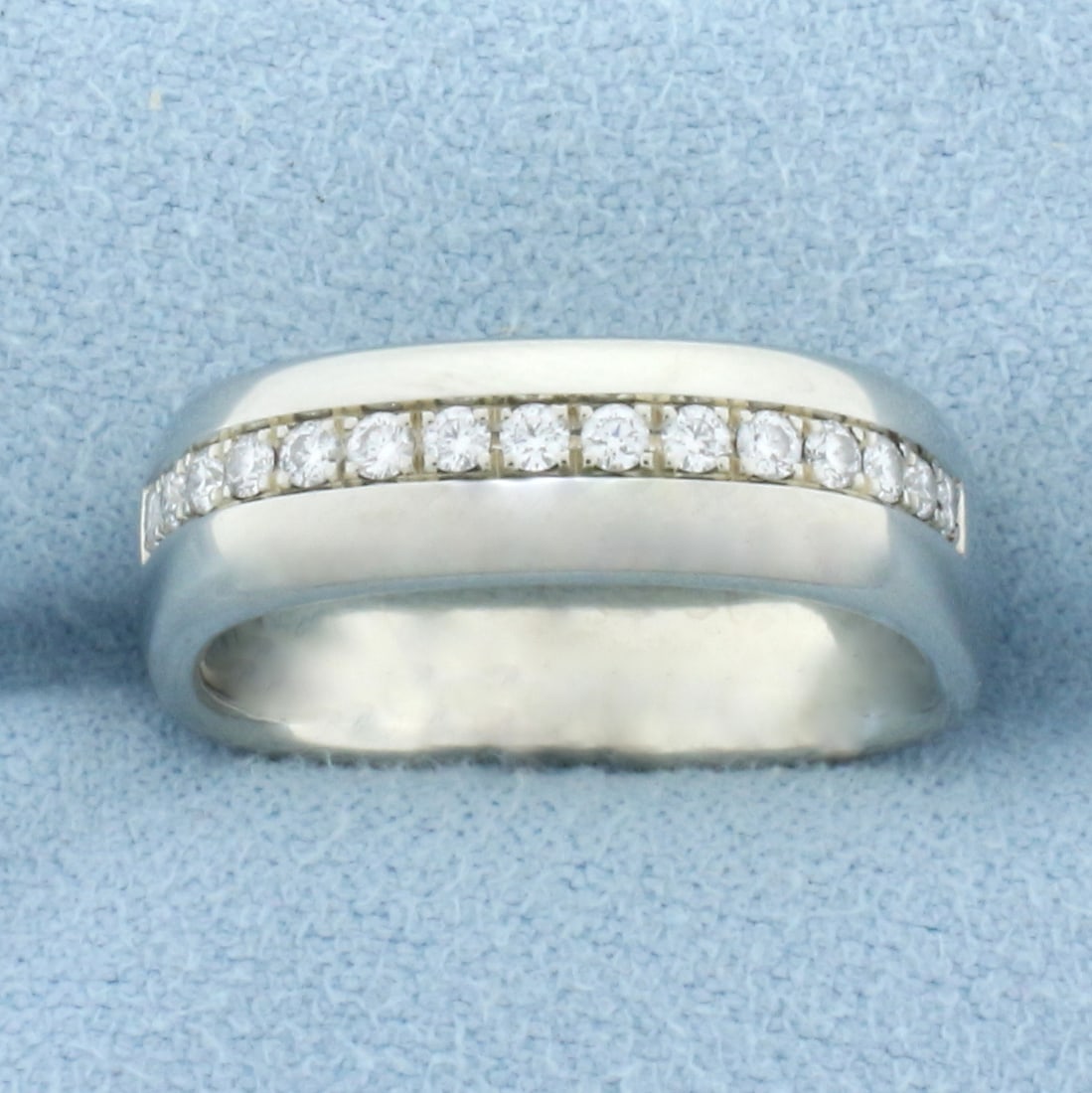 Jean-Francois Albert Diamond Line Ring in 18k White Gold: In 18k white gold. Contains fifteen high quality .02ct diamonds, VS clarity/F color. 5.8mm wide. JFA designer. Euroshank design. Size: 6.75. 8.4g.