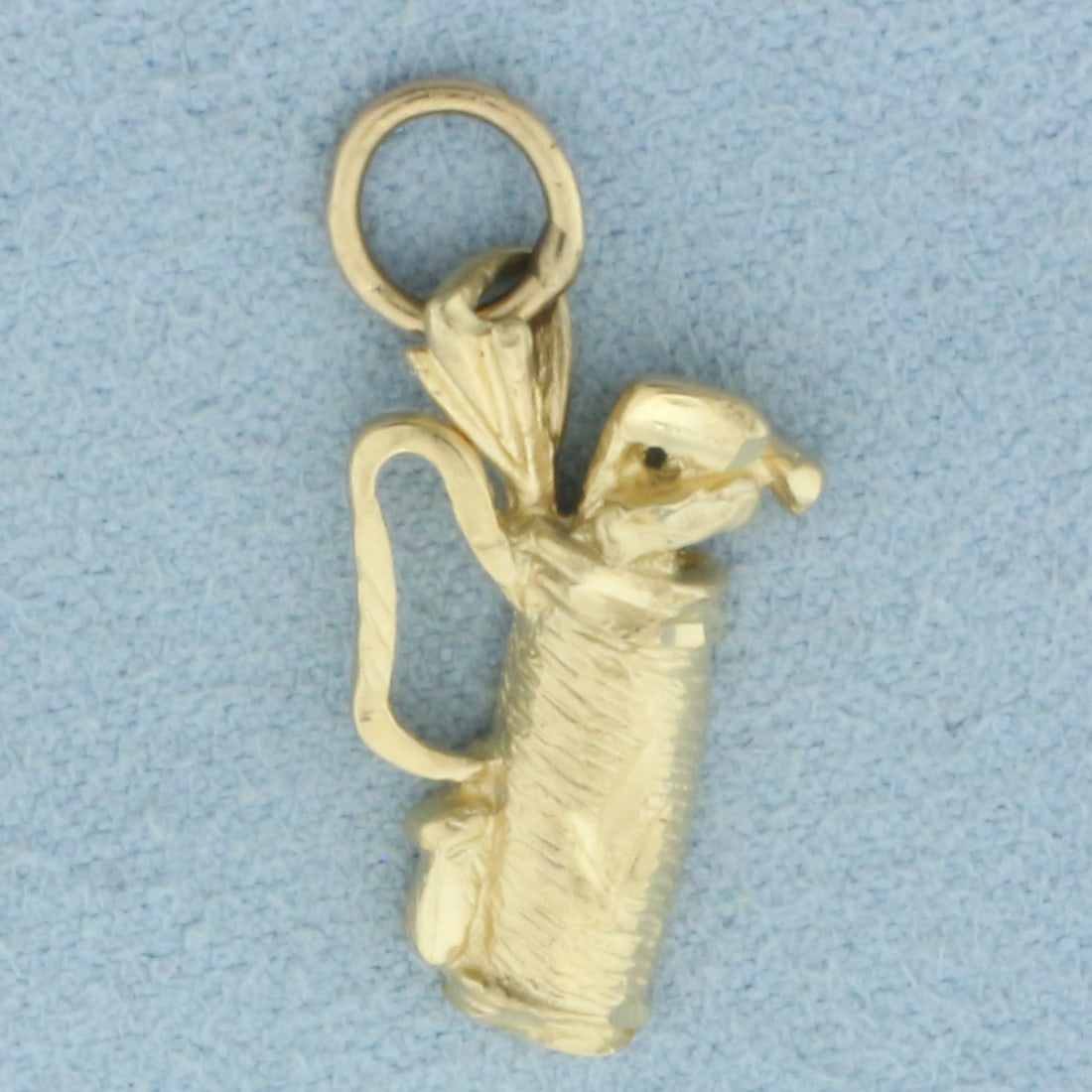 Golf Club Bag Charm or Pendant in 14k Yellow Gold: In 14k yellow gold. 7/8 inch long and 1/2 inch wide. 1.7g.