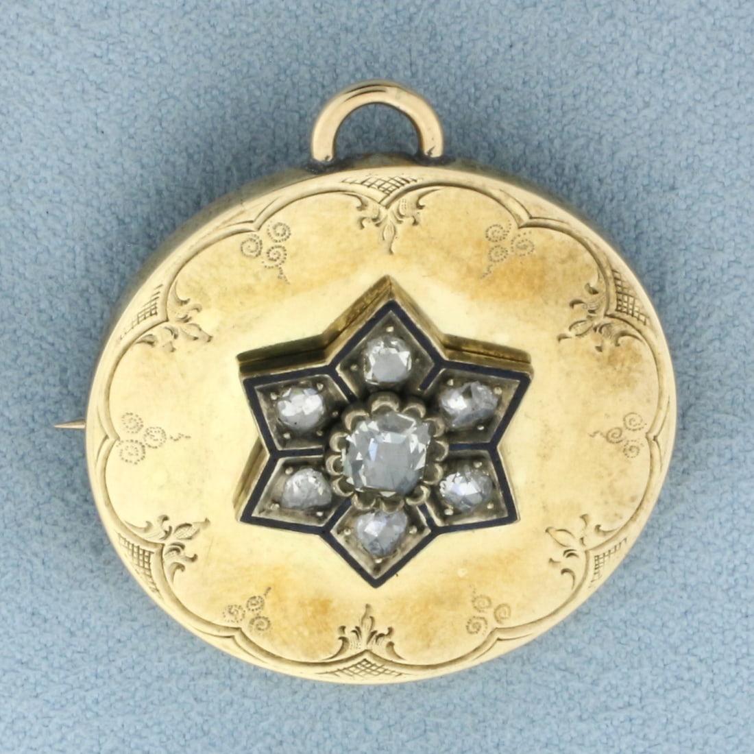 Antique Rose Diamond Pin Brooch or Pendant in 14k Yellow Gold: In 14k Yellow Gold . Contains one 1/3ct and six 1/8ct rose cut diamonds, SI clarity/H color. 1 1/4 inch long. 1 1/8 inch wide. 6.3g.