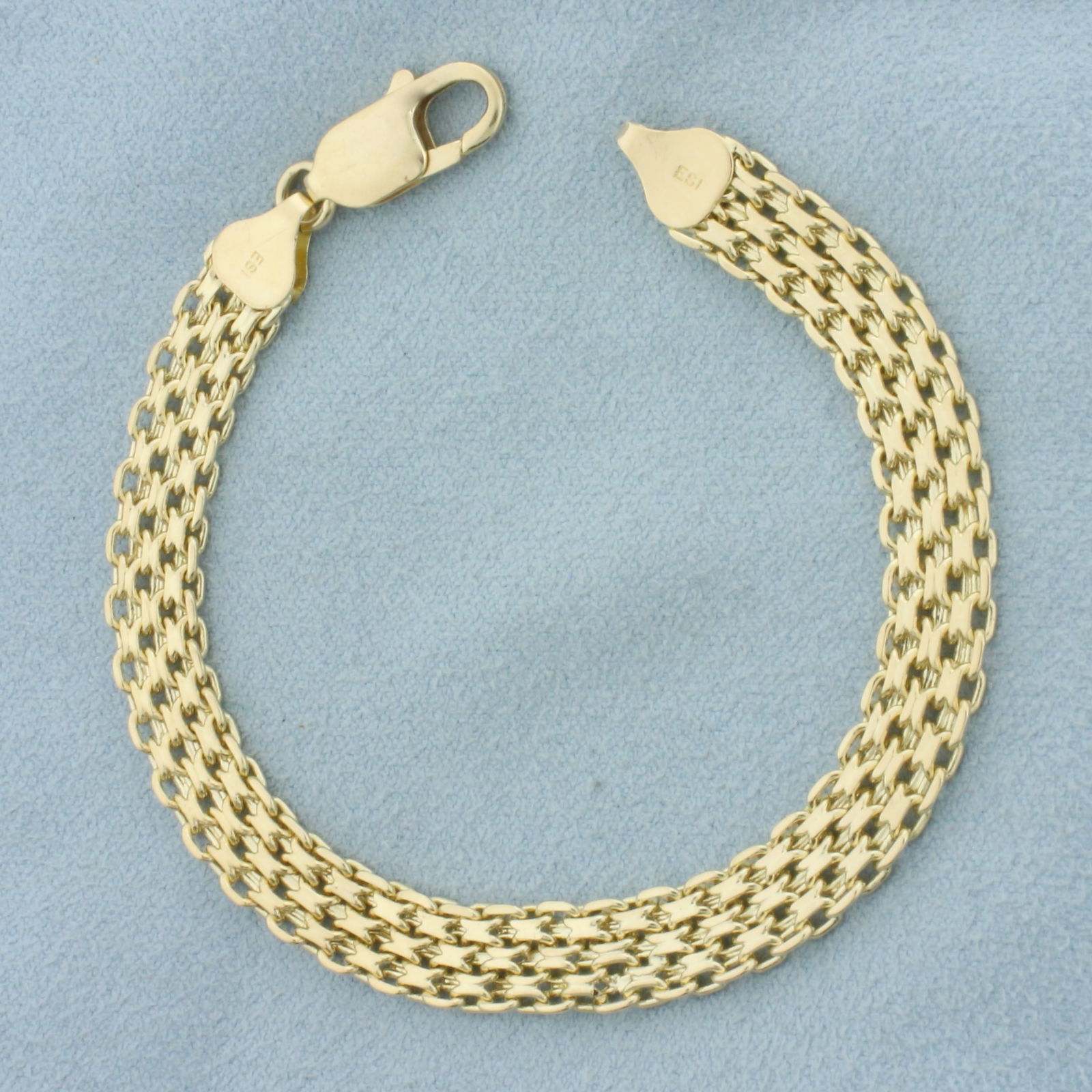 Bismark Link Bracelet in 14k Yellow Gold: In 14k Yellow Gold. 7 3/8 inches long. 7.5mm wide. Lobster clasp. 12.4g.