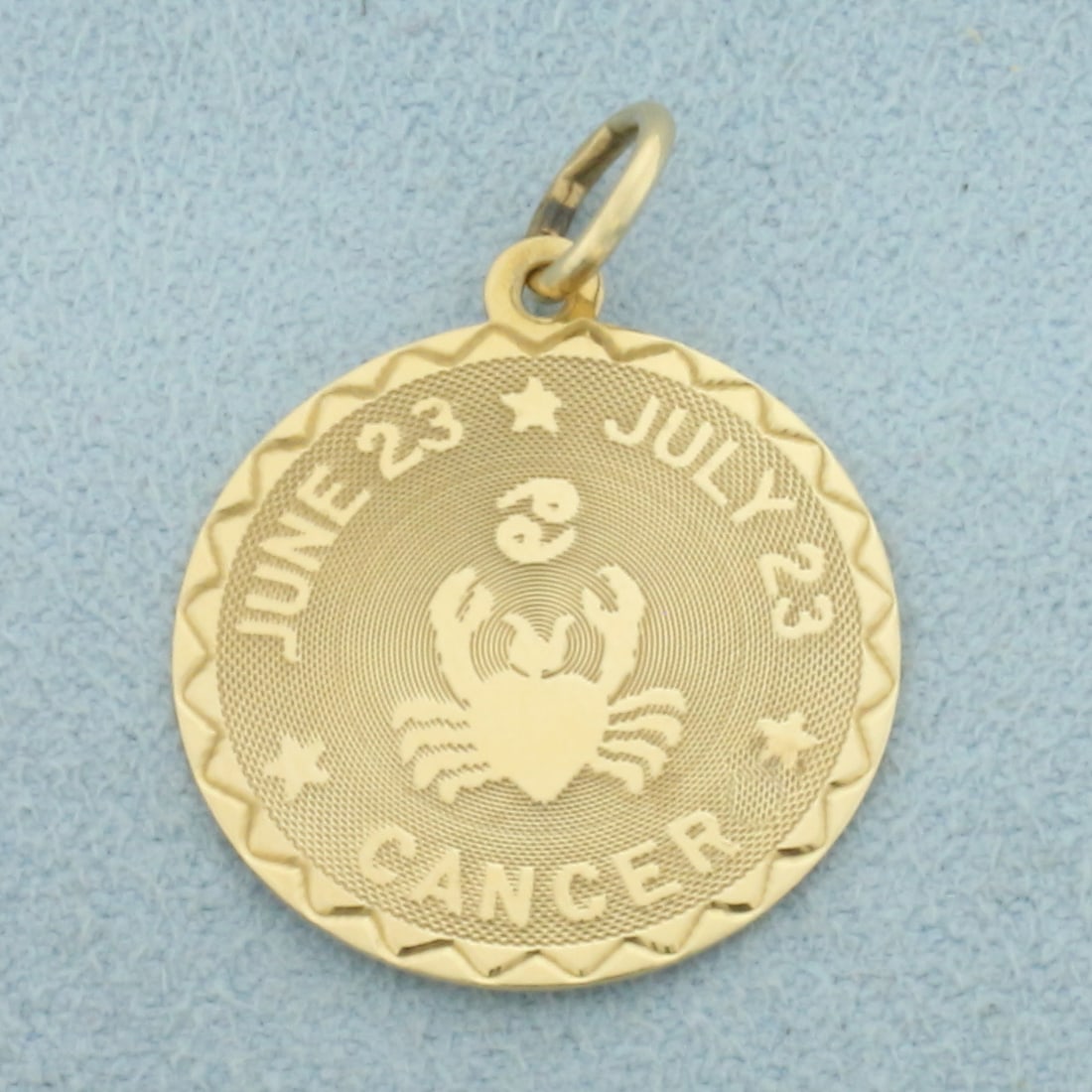 Engravable Cancer Zodiac Charm or Pendant in 14k Yellow Gold: In 14k Yellow Gold. 1 inch long including bale. 3/4 inch diameter. Blank back, can engrave name or date. 1.5g.