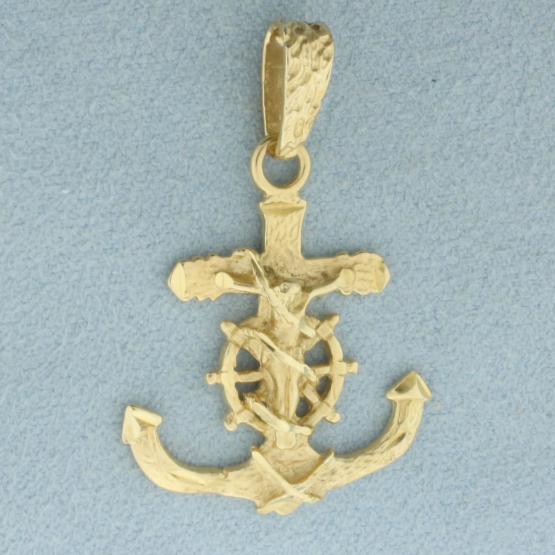Anchor Ships Wheel Crucifix Pendant in 14k Yellow Gold: In 14k Yellow Gold. 1 3/8 inch long including bale. 7/8 inch wide at widest. 3.2g.