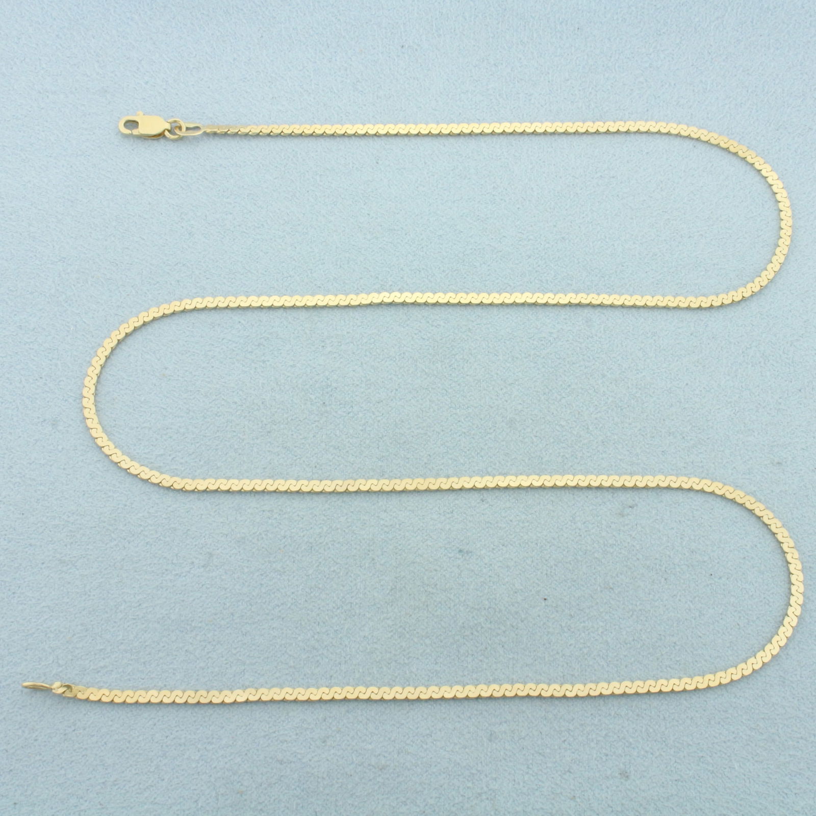 19 Inch S-Link Chain Necklace in 14k Yellow Gold: In 14k Yellow Gold. 19 inches long. 1.9mm wide. Lobster clasp. 6.2g.