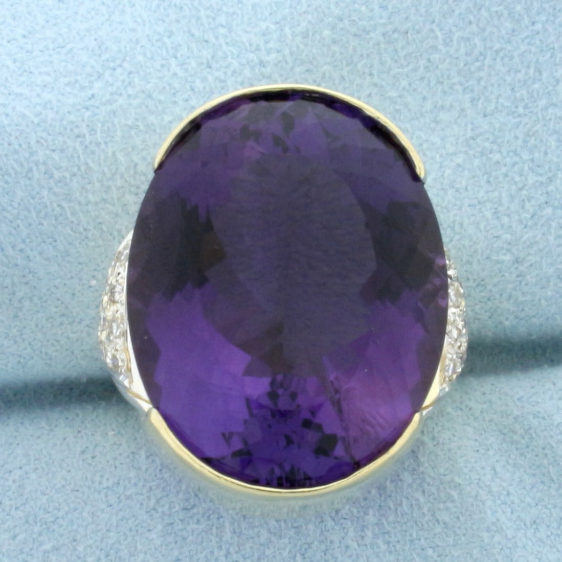 30CT Amethyst and Diamond Statement Ring in 14K Yellow Gold: In 14k Yellow Gold. Contains one high quality natural 30ct Amethyst gemstone with intense purple color and excellent color. Also contains 20 high quality .01ct diamonds, VS clarity/G color. Size 6.25,