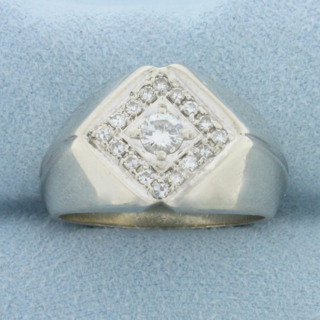 Mens Diamond Statement Ring in 14k White Gold: In 14k white gold. Contains one 1/4ct and sixteen .01ct high quality diamonds, VS clarity/F color. Size 9.75. 13.2g.