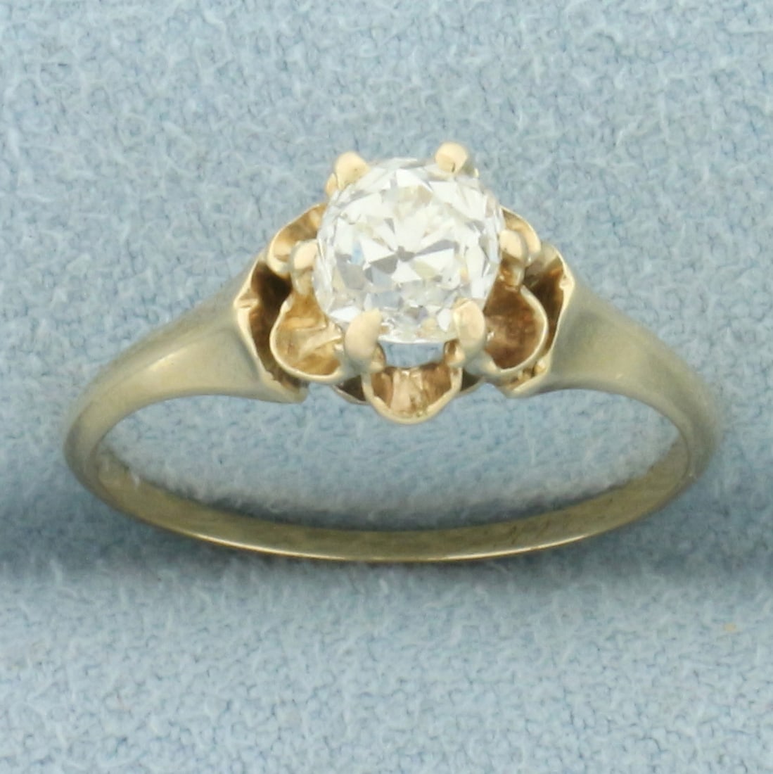 Antique 3/4ct Old Mine Cut Diamond Solitaire Engagement Ring in 14k Yellow Gold: In 14k yellow gold. Contains one high quality 3/4ct old mine cut diamond, VS clarity/J color. Very faint antique engraving inside, can be polished out if desired. Size: 6. 2.0g.