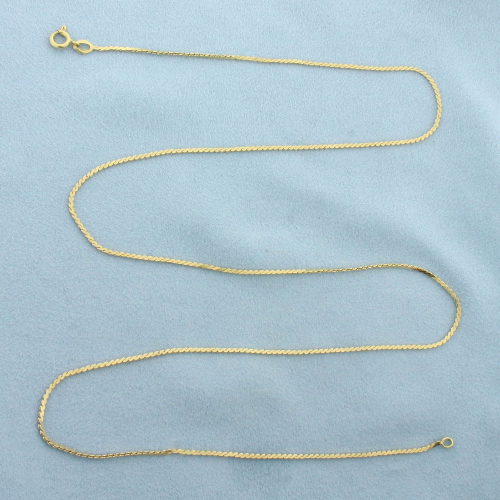 Italian 24 Inch S-Link Chain in 18k Yellow Gold: In 18k Yellow Gold. 24 inch long. 1.3mm wide. Italian. Spring clasp. 5.6g.