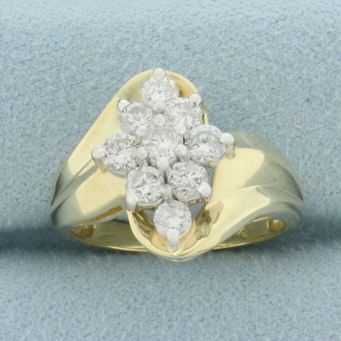 Diamond Flower Cocktail Ring in 14k Yellow Gold: In 14k Yellow Gold. Contains nine 1/8ct high quality diamonds, 1ct TW, G color/I1 clarity, eye clean, great cut for added brilliance. 15.7mm wide at center. Size 7. 5.4g/