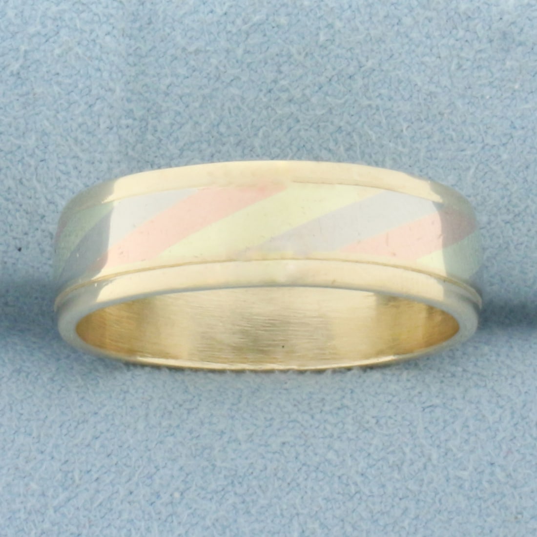 Mens Tri-Color Striped Wedding Band Ring in 14k Yellow, Rose, and White Gold: In 14k Yellow, Rose, and White Gold. 6.7mm wide. Size 12. 7.9g.