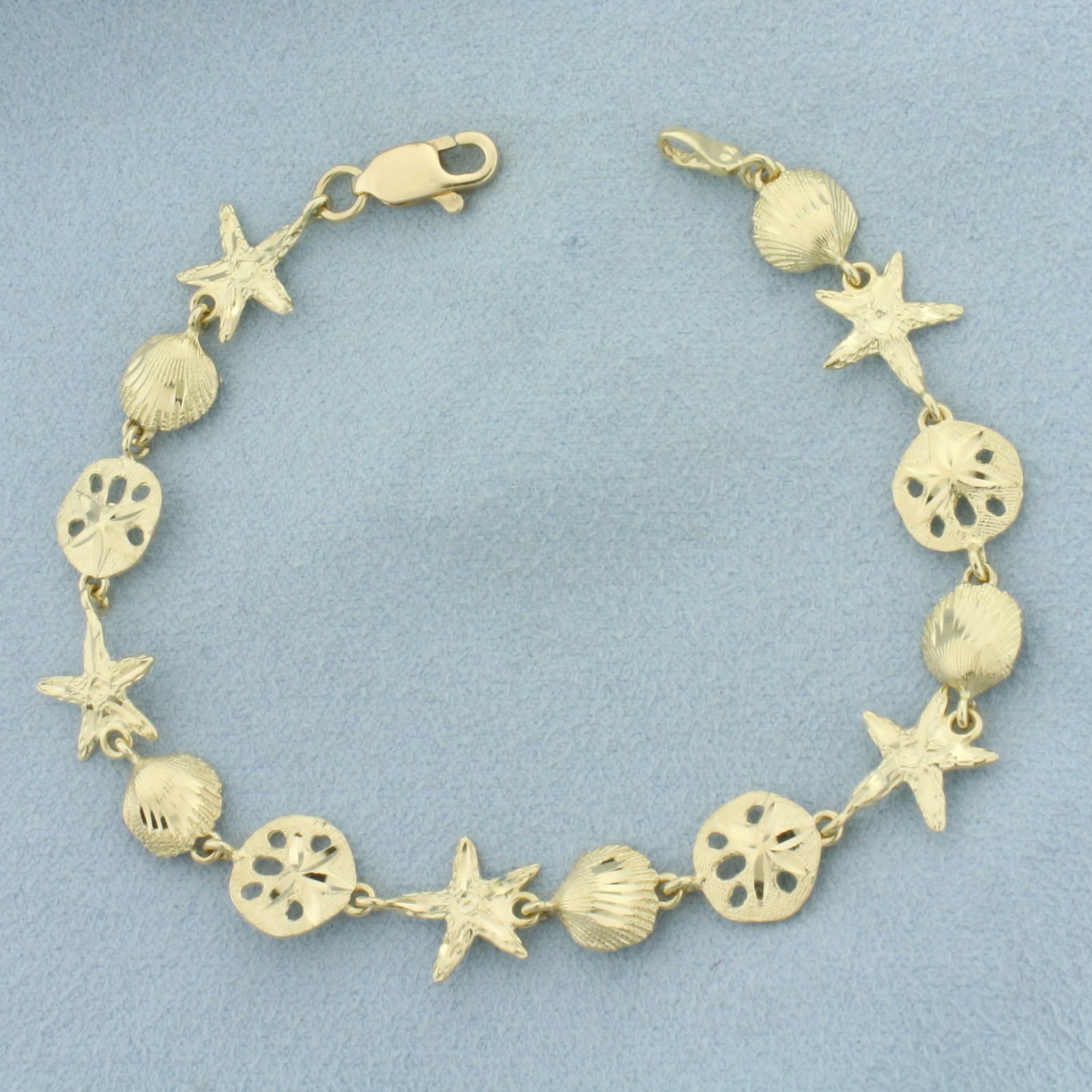 Sea Life Starfish Seashell Sand Dollar Bracelet in 14k Yellow Gold (1 of 2)