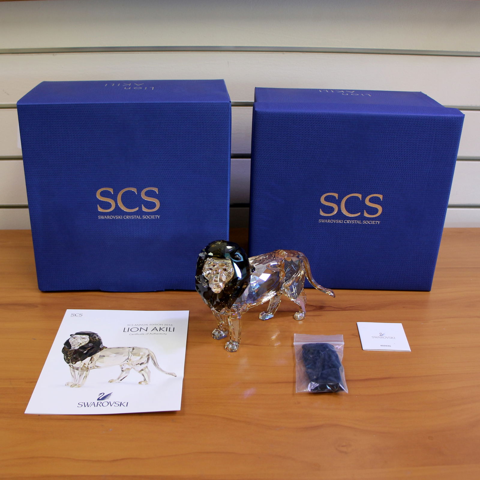 Swarovski Crystal Signed 5135894 Lion Akili SCS 2016 with Box and COA: Excellent condition, SIGNED in Wattens. With box and certificate AND 5236549 SCS16 Lion Hed Tack Pin.