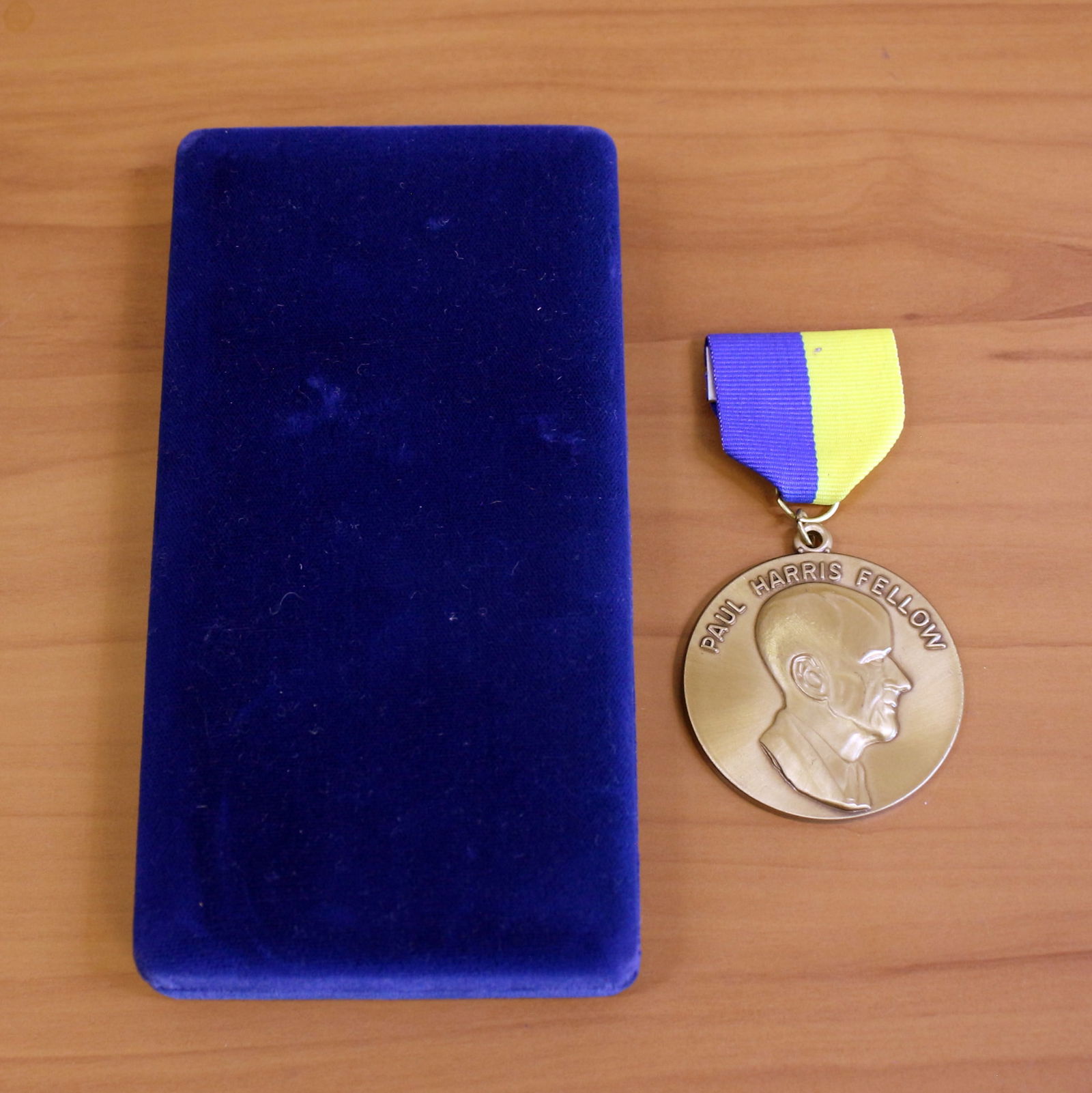 Rotary International Paul Harris Fellow Medallion and Ribbon Boxed: Contains one Rotary International Paul Harris Fellow Medallion and Ribbon. Includes original display case.