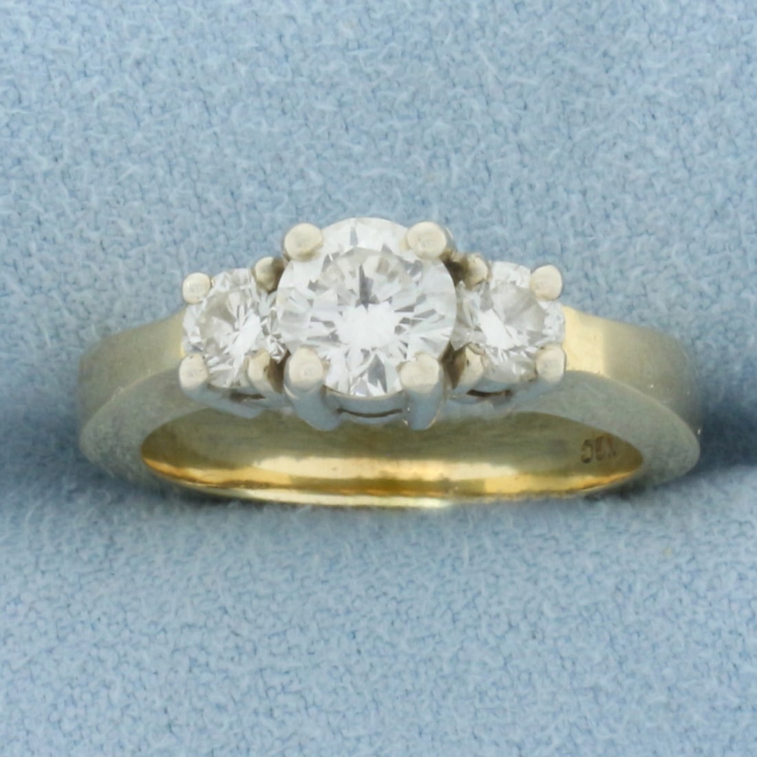 Three Stone Diamond Engagement or Anniversary Ring in 14k Yellow Gold: In 14k yellow gold. Center diamond is 3/4 ct surrounded by two 1/4 ct diamonds. They are all high quality diamonds, VS clarity/H color and excellent cut for lots of sparkle. Size 6 1/2. 6.6g.