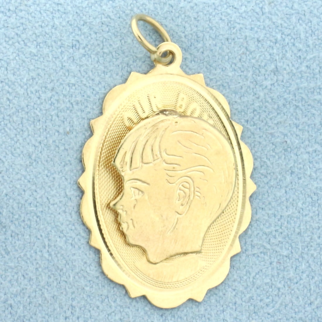 Engravable "Our Boy" Son Silhouette Charm or Pendant in 14k Yellow Gold: In 14k Yellow Gold. 1 1/8 inch long by 3/4 inch wide. Engravable on back to add name or date. 2.1g.