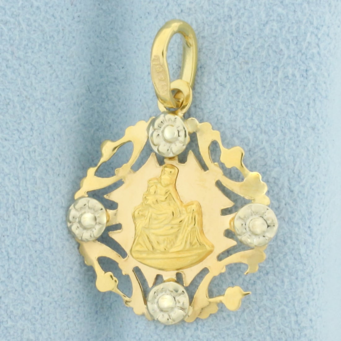 Our Lady of Pompeii Charm in 8k Yellow Gold with White Gold Accents: In 8k Yellow Gold with White Gold Accents. 7/8 inch long. 7/8 inch wide. 1.9g.