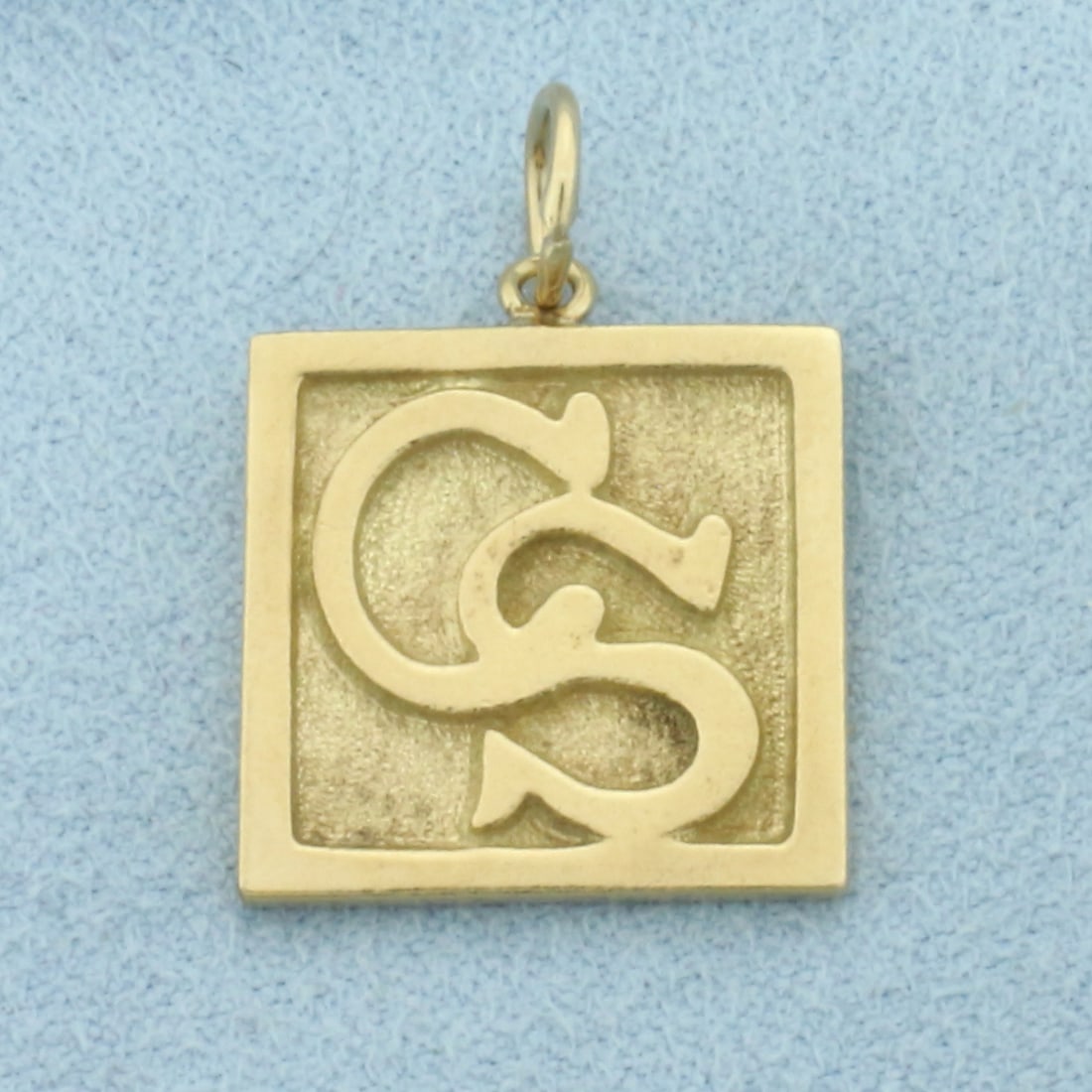 Confederate States Charm or Pendant in 10k Yellow Gold: In 10k Yellow Gold. 1 inch long. 5/8 inch wide. Heart Jesus Fish on back. 3.3g.