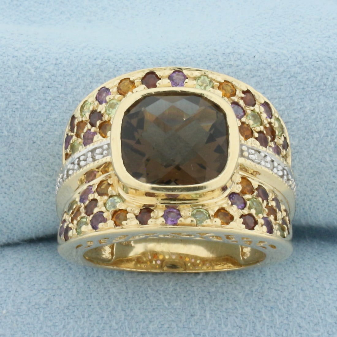 Rainbow Gemstone Statement Ring in 10k Yellow Gold: In 10k yellow gold. 17.5mm wide at top of ring. Contains one high quality natural 10.5mm fancy checkerboard cut Smoky Quartz gemstone with intense color and excellent clarity. Also contains fifty-four