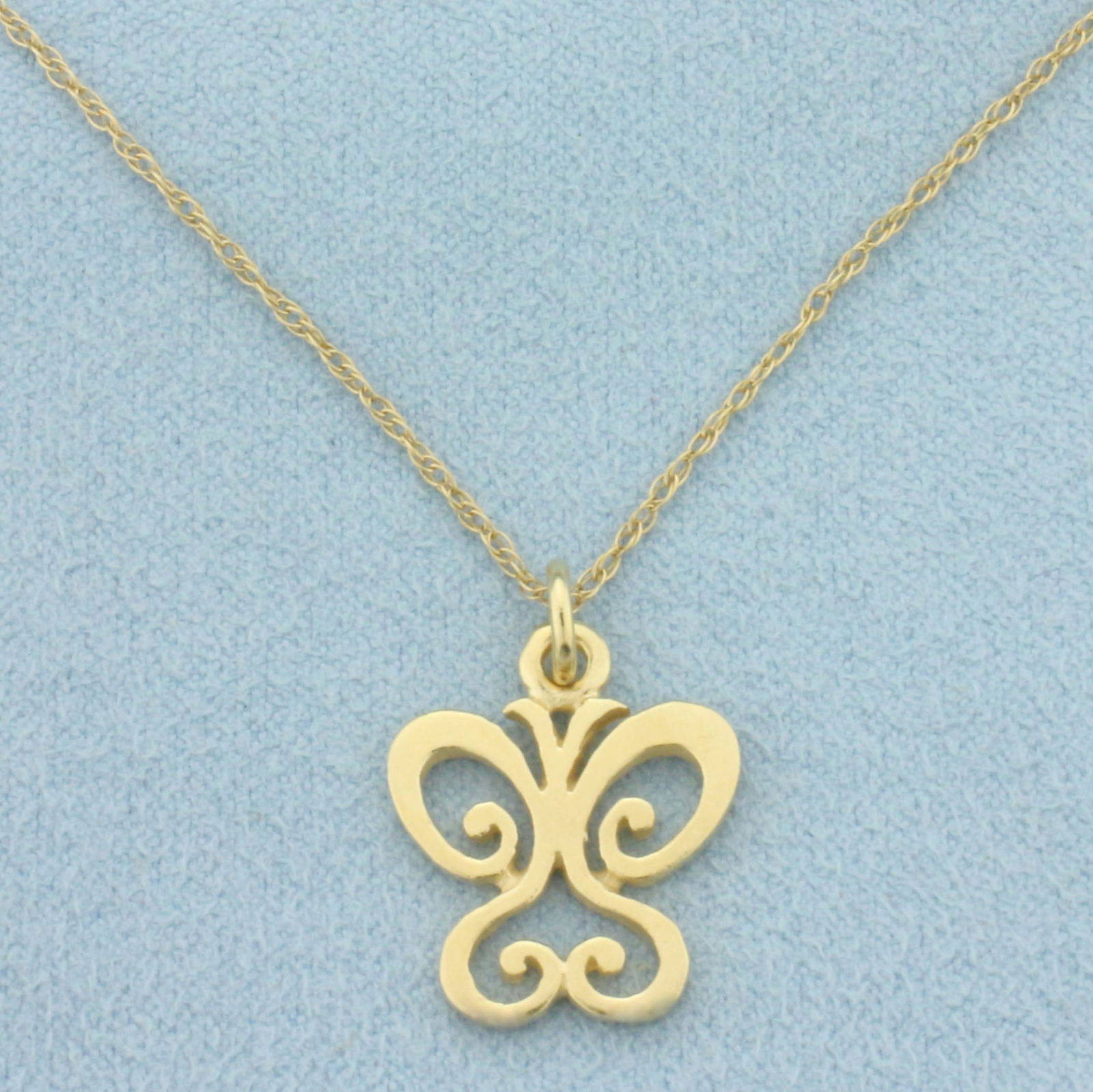 Vintage Butterfly Necklace in 14k Yellow Gold: In 14k Yellow Gold. Butterfly is 3/4 inch long by 5/8 inch wide. Chain is 19.5 inches long by 1mm thick. 2.8g.