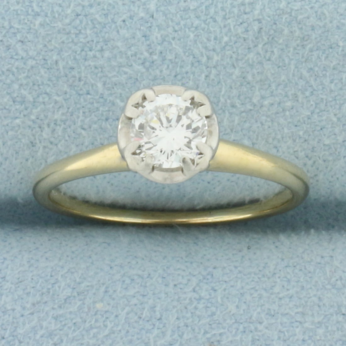 Vintage Diamond Solitaire Engagement Ring in 14k Yellow Gold: In 14k Yellow Gold with 14k White Gold Head. Contains one high quality 1/2ct round brilliant diamond, VS2 clarity/G color, eye clean, great cut for added brilliance. Size 7.5. 2.3g.