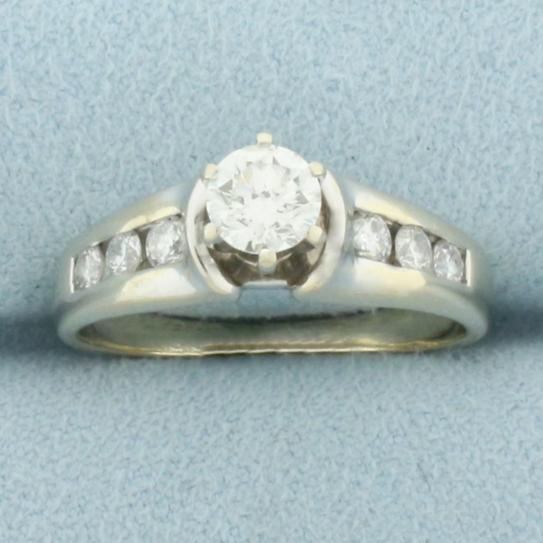 Diamond Cathedral Style Engagement Ring in 14k White Gold: In 14k White Gold. Center diamond is high quality 1/2ct round brilliant, SI1 clarity/H color, eye clean, great cut for added brilliance. Also contains six accent diamonds, 1/3ct TW, of similar high qu