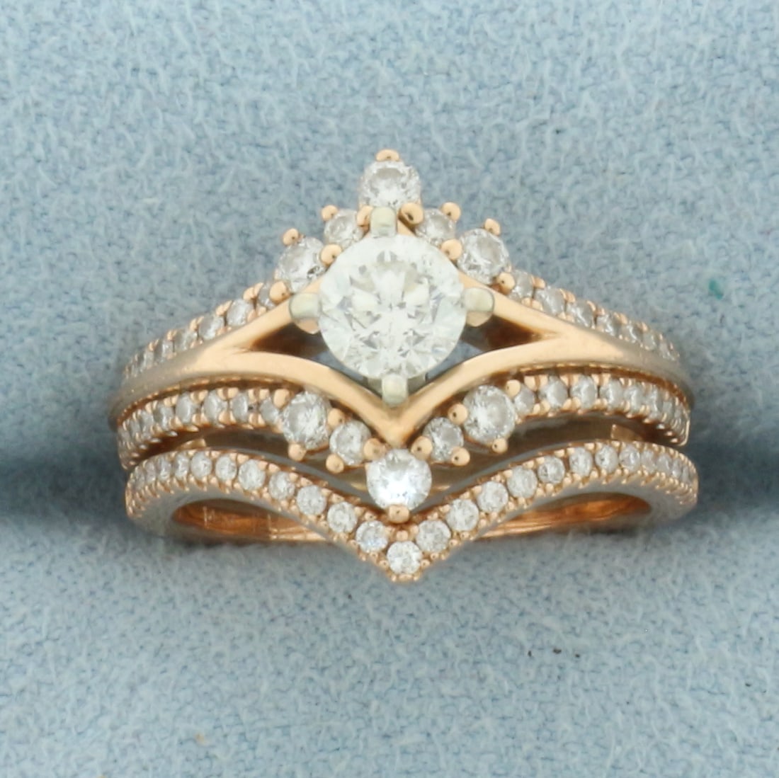 Diamond Engagement Ring and Wedding Ring Bridal Set in 14k Rose Gold: In 14k Rose Gold. Center diamond is .4ct round brilliant, H color/I clarity, eye clean, great cut for added brilliance. Also contains 1ct TW of side diamonds on engagement ring and band of similar hig