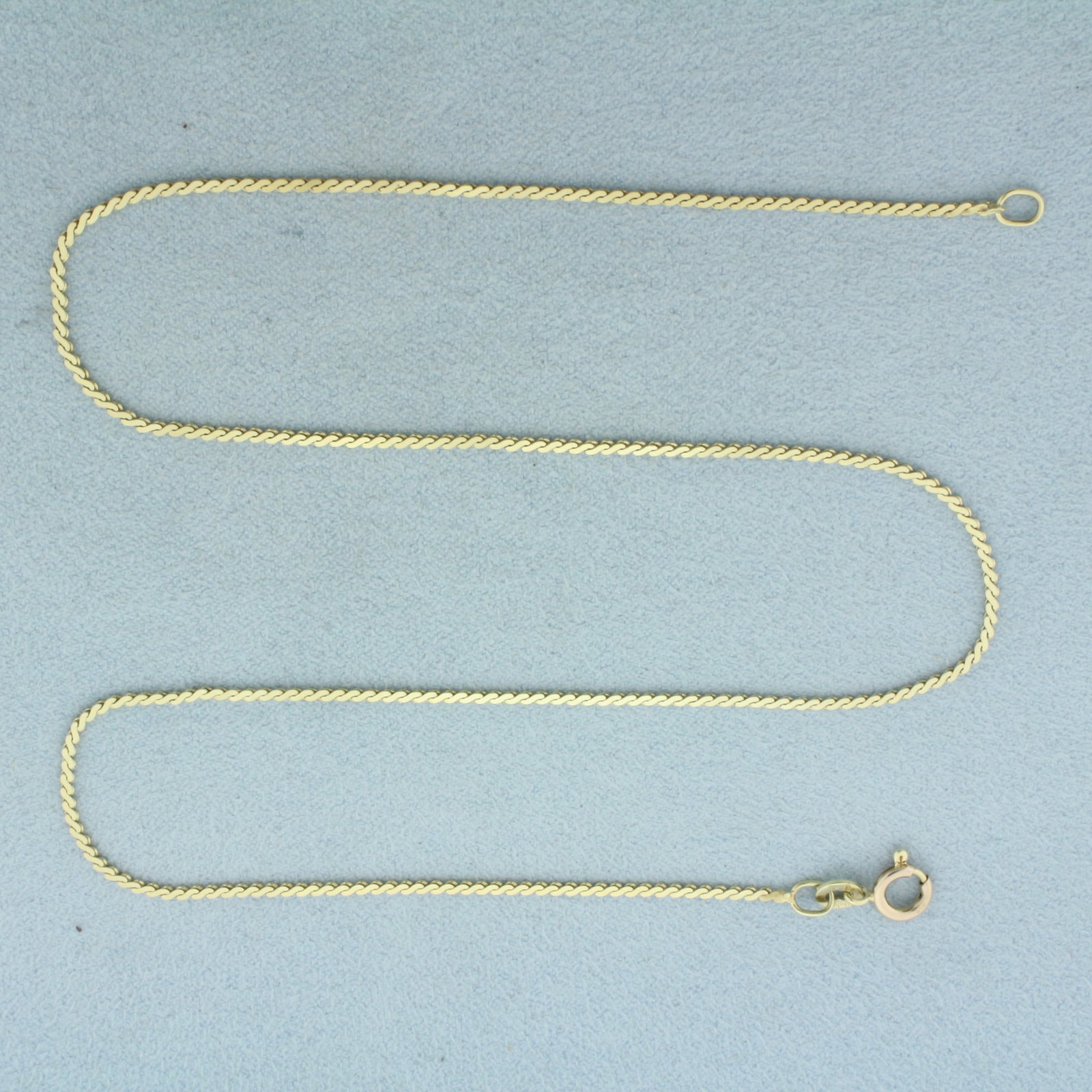Italian 15 Inch S-Link Chain Necklace in 14k Yellow Gold: In 14k Yellow Gold. 15 inches long. 1.2mm wide. Spring clasp. 2.8g.