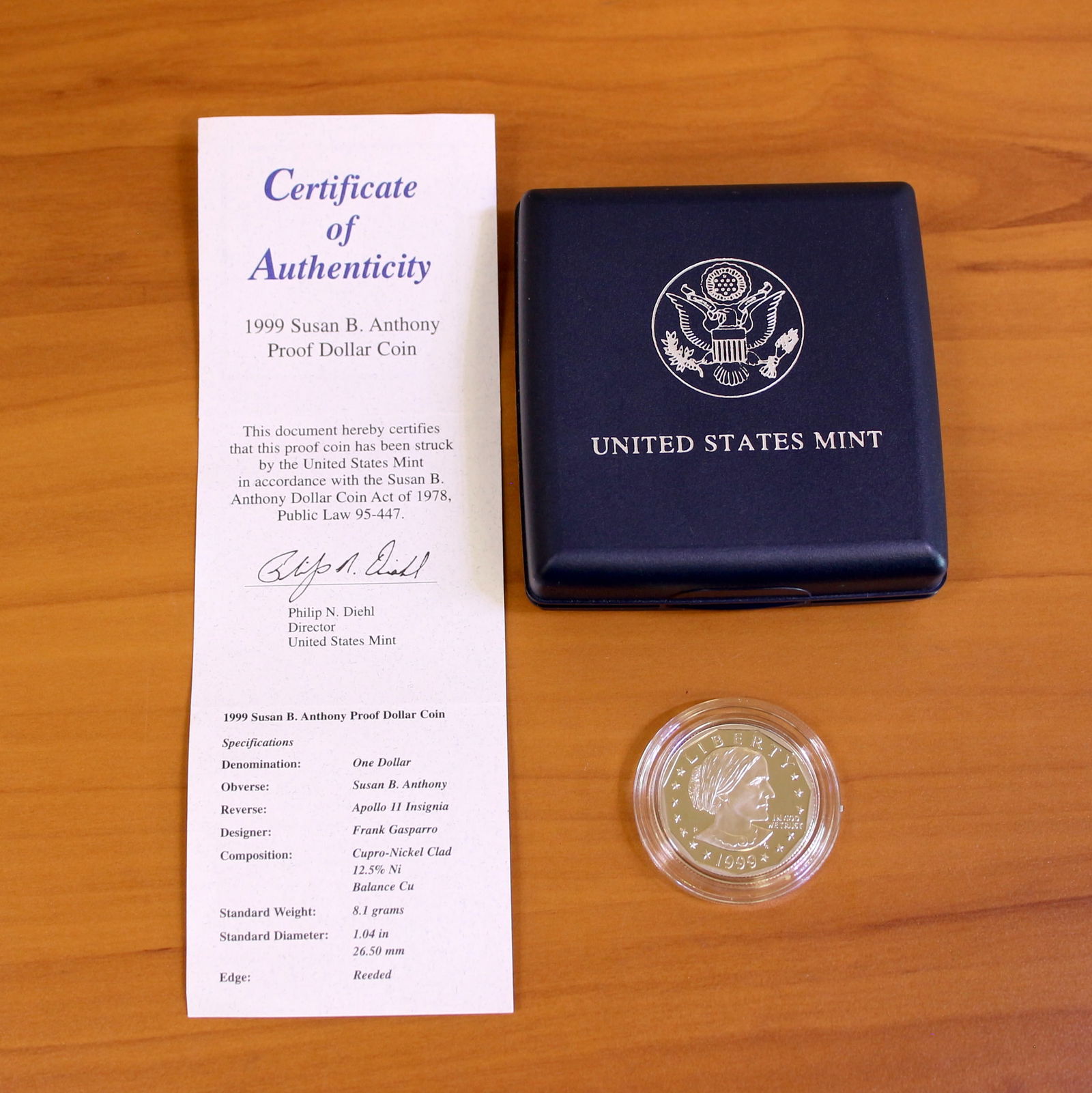 1999 US Mint Susan B. Anthony Proof Dollar Coin OGP: Contains one 1999 United States Mint Susan B. Anthony Proof Dollar Coin. Set in original government packaging and contains certificate of authenticity.