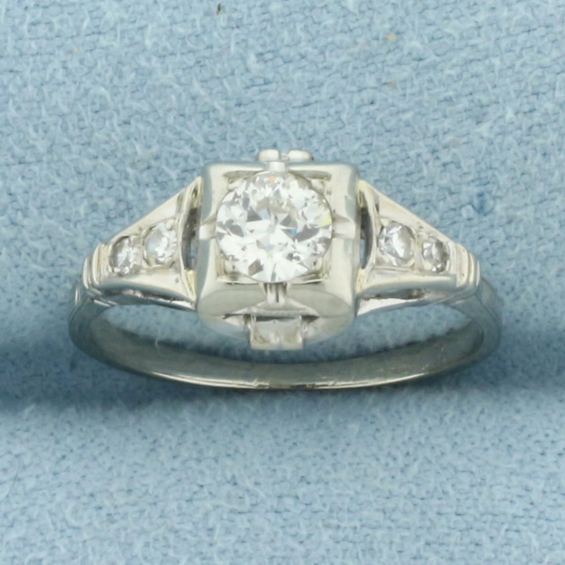 Antique Old European Diamond Art Deco Ring in 18k White Gold: In 18K White Gold. Contains one 1/3ct high quality old European cut diamond, VS clarity/G color. Also contains four high quality antique old European cut diamonds, .06ct TW, of similar high quality. 8