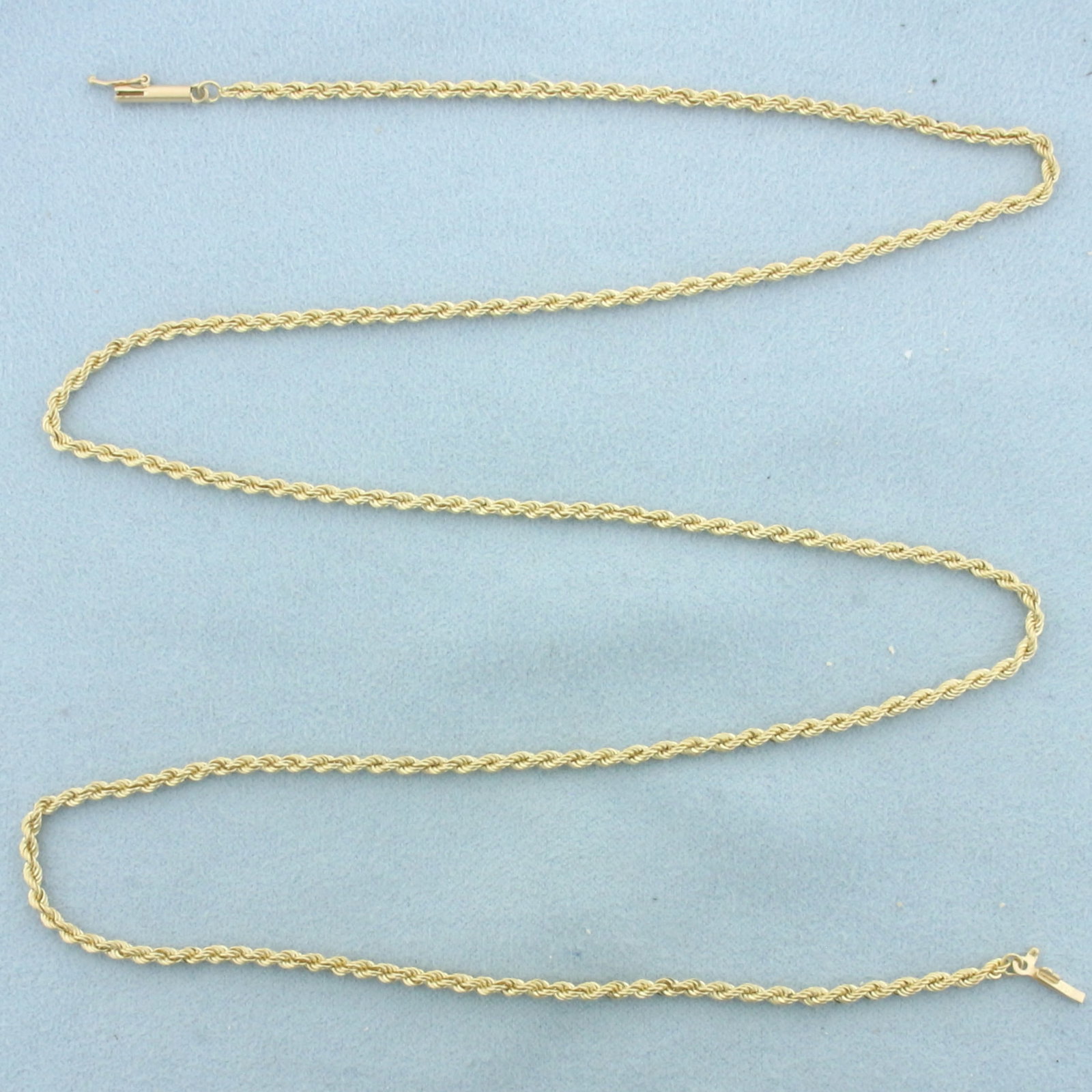24 Inch Rope Link Chain Necklace in 14k Yellow Gold: In 14k Yellow Gold. 24 inch long. 2.2mm inch wide. Barrel clasp with safety latch. 10.8g.