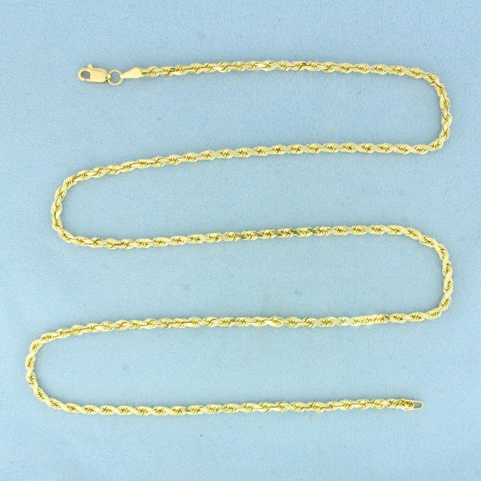 Mens 24 Inch Rope Link Chain Necklace in 14k Yellow Gold: In 14k Yellow Gold. 24 inches long. 2.5mm wide. Lobster clasp. 18.6g.