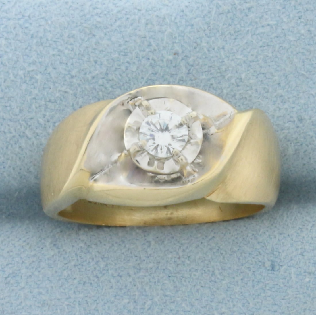 Diamond Solitaire Engagement Ring in 14K Yellow Gold with Matte Finish: In 14K Yellow and White Gold. Contains one high quality 1/3ct Round Brilliant Diamond, VS clarity/H color. Unique reflective setting makes diamond look double the size. Matte finish on shank. Size 9.