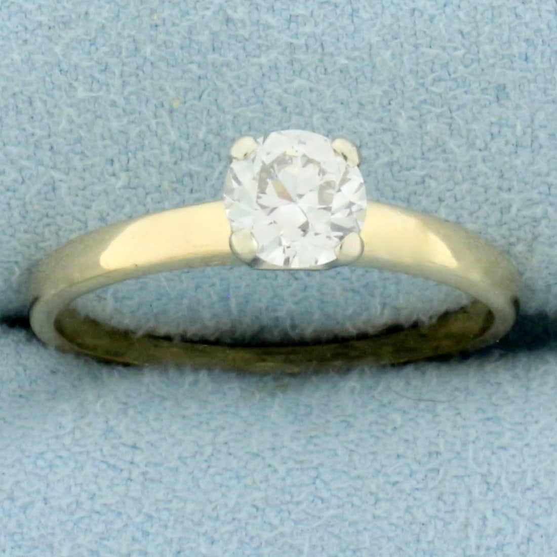 Vintage Old European Cut Diamond Solitaire Engagement Ring in 14k Yellow Gold: In 14k yellow gold with white gold 4 prong head. Contains one high quality 2/3ct Old European Cut diamond, VS clarity/H color. Size 7.5. 2.0g.