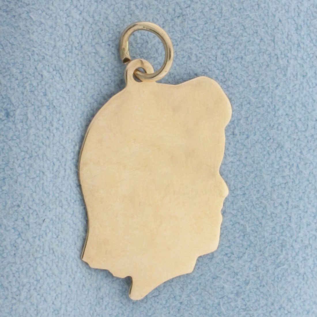 Engravable Girl Silhouette Charm in 14k Yellow Gold: In 14k Yellow Gold. 1 inch long, 5/8 inch wide. Can engrave name or date on charm. 1.4g.