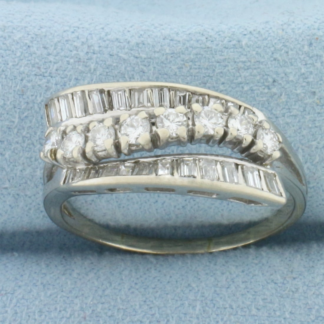 Diamond Wave Design Ring in 14k White Gold: In 14k White Gold. Contains eight round and twenty four baguette high quality diamonds, 2ct TW, VS clarity/G color. 9.5mm wide. Size 11.25. 4.8g.