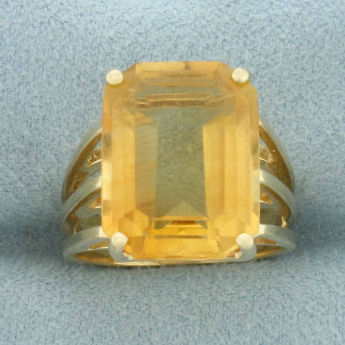 Citrine Solitaire Statement Ring in 14k Yellow Gold: In 14k Yellow Gold. Contains one high quality natural 16mm Citrine gemstone, approximately 10ct, with intense color and excellent clarity. Size 5.75. 7.1g.