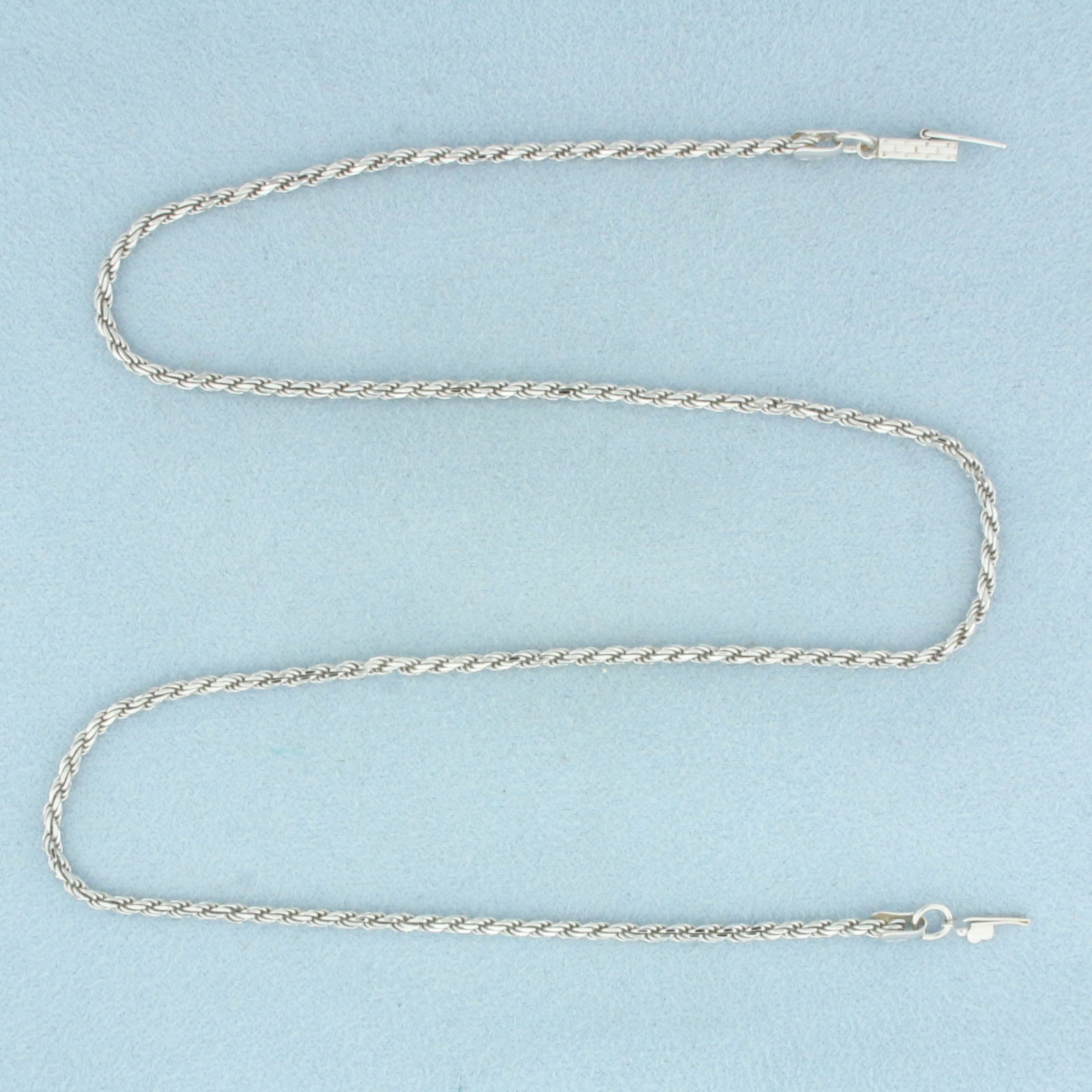 16 Inch Italian Rope Link Chain Necklace in 14k White Gold: In 14k White Gold. 16 inches long. 1.7mm thick. Italian made. Squared barrel clasp with safety latch. 6.5g.