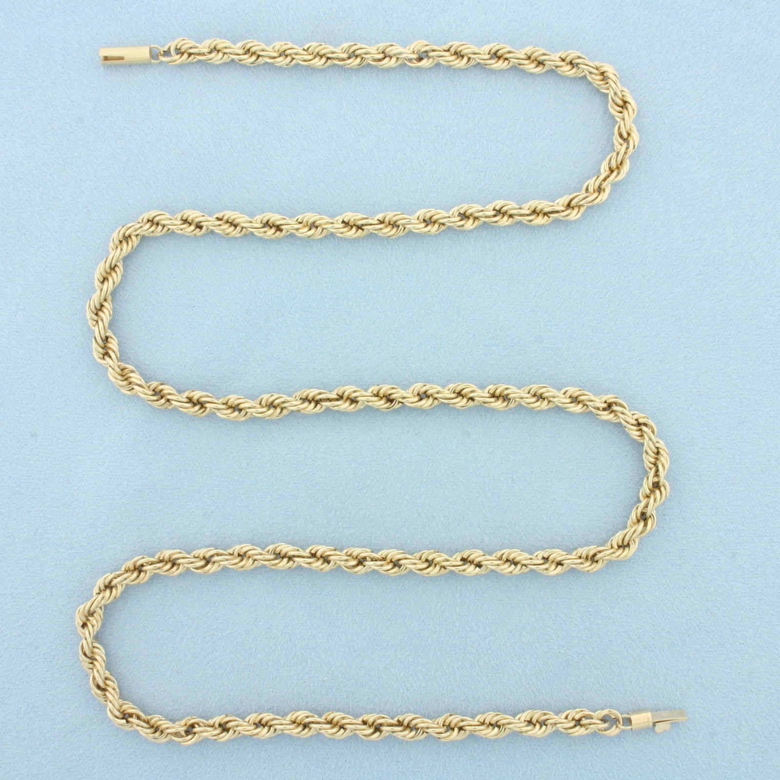 25 Inch Rope Link Chain Necklace in 10k Yellow Gold: In 10k Yellow Gold. 25 inches long. 5.3mm wide. Barrel clasp. 17.7g.